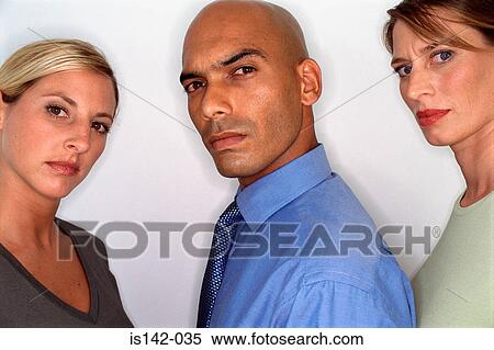 Stock Photography - Male & females look at camera. Fotosearch