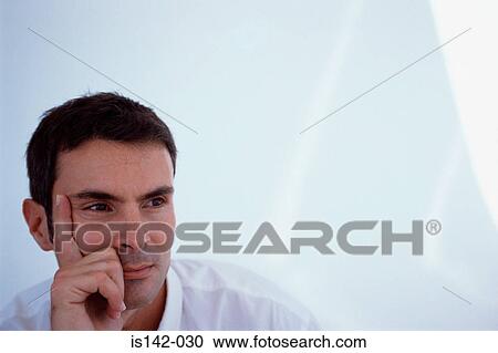Portrait of man concentrating View Large Photo Image Stock Image - Portrait of man concentrating. Fotosearch