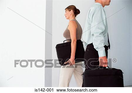 Stock Image - Professional man and woman. Fotosearch