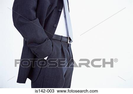 Stock Image - Torso of businessman in suit. Fotosearch
