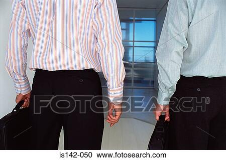 Two businessmen with laptops View Large Photo Image Stock Image - Two businessmen with laptops. Fotosearch