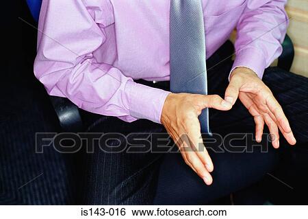 Man gesticulating with hands View Large Photo Image Stock Photograph - Man gesticulating with hands. Fotosearch