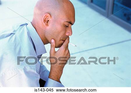 Man having a smoke View Large Photo Image Stock Photography - Man having a smoke . Fotosearch