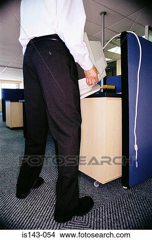 Man shifting computer View Large Photo Image Picture - Man shifting computer. Fotosearch