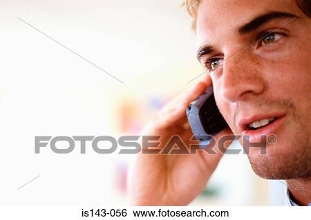 Man with mobile phone View Large Photo Image Stock Photograph - Man with mobile phone. Fotosearch