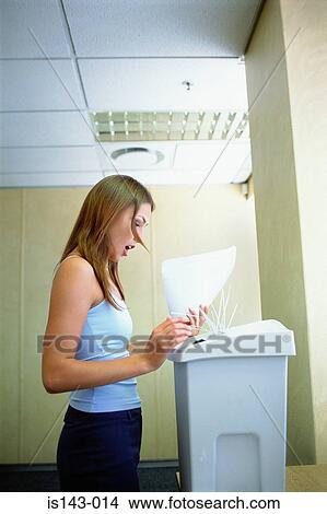 Picture - Paper shredder backfires. Fotosearch