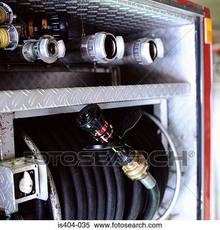 Hoses on fire-engine View Large Photo Image Stock Photography - Hoses on fire-engine. Fotosearch