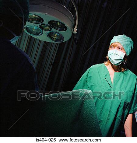Nurse monitoring operation View Large Photo Image Stock Photograph - Nurse monitoring operation. Fotosearch