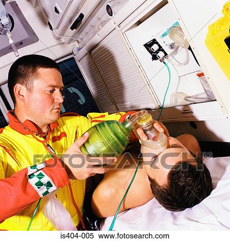 Stock Photography - Patient receiving oxygen. Fotosearch