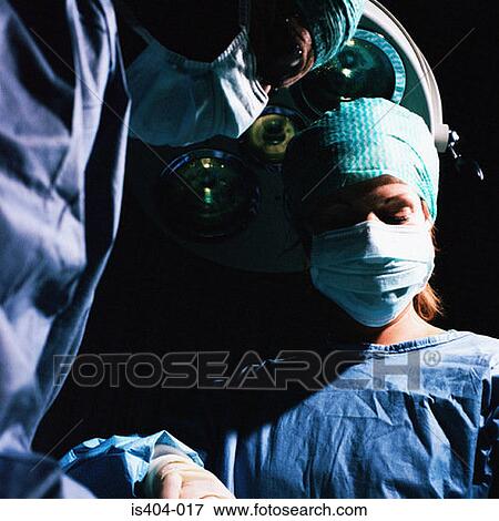Stock Photo - Surgical team with patient. Fotosearch