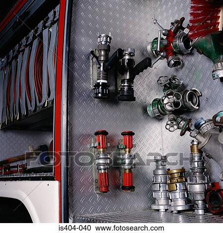 Stock Image - Water nozzles in fire-engine. Fotosearch