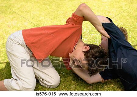 Boys play at wrestling View Large Photo Image Stock Photography - Boys play at wrestling. Fotosearch