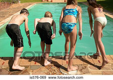 Children about to jump in pool View Large Photo Image Stock Photo - Children about to jump in pool. Fotosearch