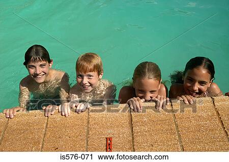 Children smiling at poolside View Large Photo Image Stock Image - Children smiling at poolside. Fotosearch