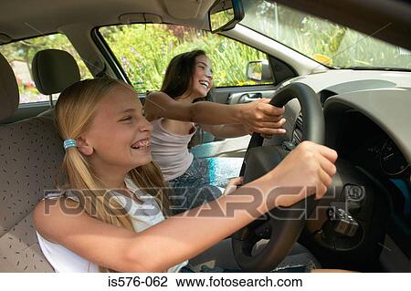 Girls having fun in car View Large Photo Image Stock Image - Girls having fun in car. Fotosearch