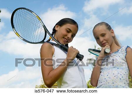 Young girls with racquets View Large Photo Image Stock Photo - Young girls with racquets. Fotosearch