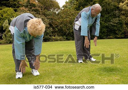 Older couple exercise outdoors View Large Photo Image Picture - Older couple exercise outdoors. Fotosearch