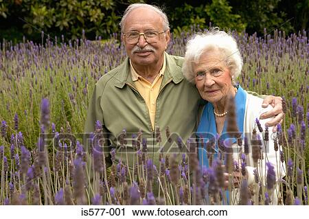 Older couple in lavender field View Large Photo Image Stock Image - Older couple in lavender field. Fotosearch