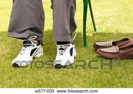 Older man wearing trainers View Large Photo Image Stock Image - Older man wearing trainers. Fotosearch