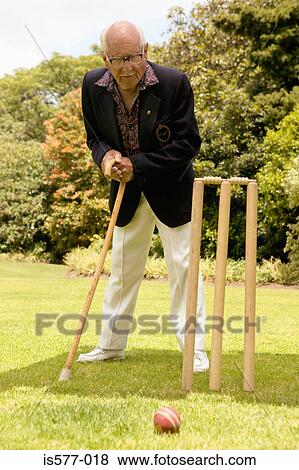 Older man with walking stick View Large Photo Image Stock Photo - Older man with walking stick. Fotosearch