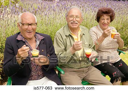 Older people enjoying dessert View Large Photo Image Stock Image - Older people enjoying dessert. Fotosearch
