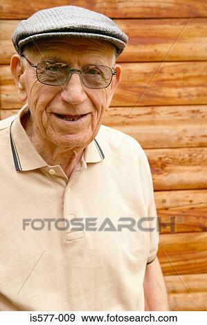 Stock Photo - Portrait of smiling older man. Fotosearch