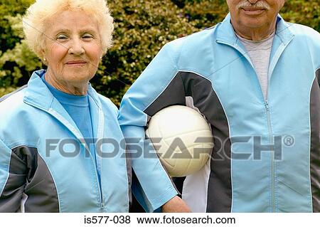 Sporty older couple outdoors View Large Photo Image Stock Photo - Sporty older couple outdoors. Fotosearch