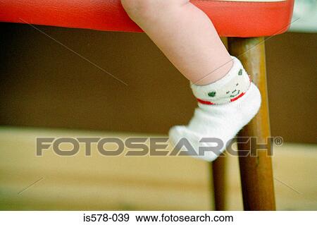 Baby foot with sock on View Large Photo Image Stock Photo - Baby foot with sock on. Fotosearch