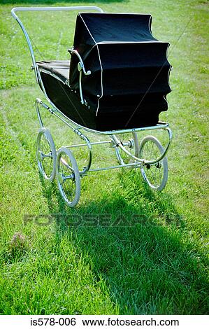 Classic black pushchair View Large Photo Image Stock Photograph - Classic black pushchair. Fotosearch