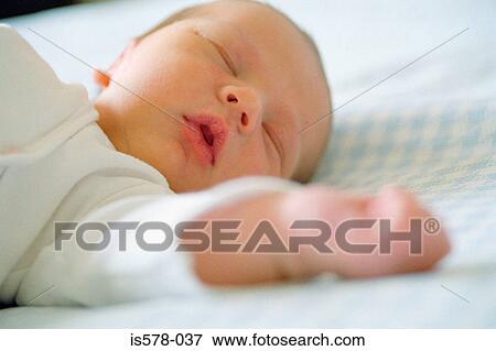 New born asleep View Large Photo Image Stock Photo - New born asleep. Fotosearch
