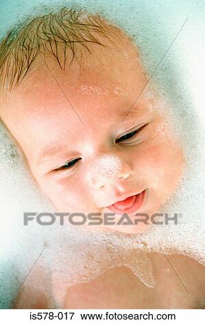 Soapy happy baby View Large Photo Image Stock Photo - Soapy happy baby. Fotosearch