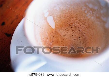 Stock Photograph - Dregs in empty coffee cup. Fotosearch