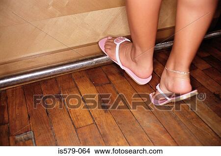 Female at the bar with sandals View Large Photo Image Picture - Female at the bar with sandals. Fotosearch