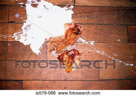 Stock Photo - Food in a mess on the floor. Fotosearch