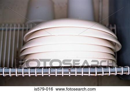 Stock Photograph - Stack of washed bowls. Fotosearch