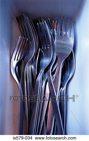 Picture - Stainless steel cutlery in tray. Fotosearch