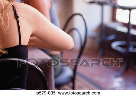 Two young women in cafe View Large Photo Image Stock Photography - Two young women in cafe. Fotosearch