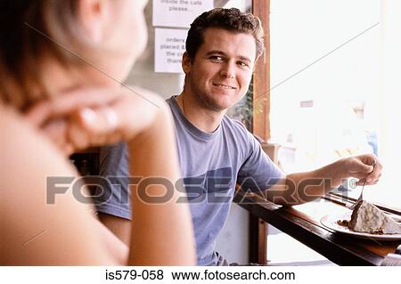 Young couple with dessert View Large Photo Image Stock Photo - Young couple with dessert. Fotosearch