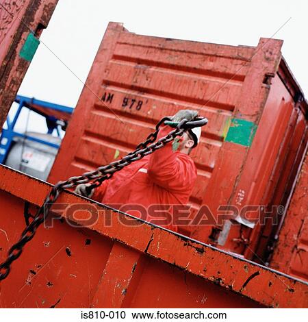 Construction worker holding chain View Large Photo Image Stock Image - Construction worker holding chain. Fotosearch