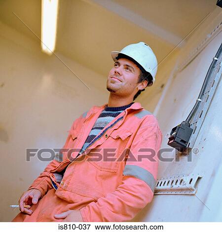 Construction worker smoking View Large Photo Image Stock Photo - Construction worker smoking. Fotosearch