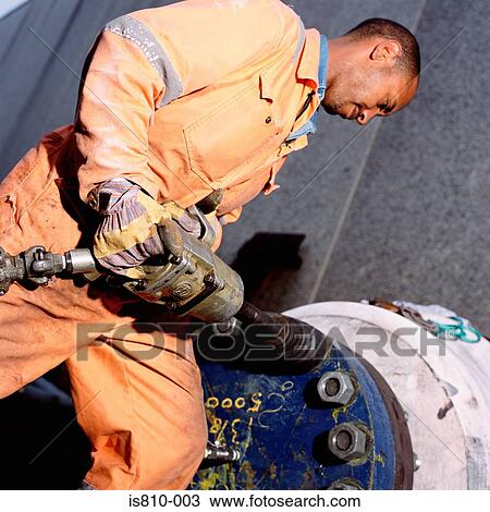 Construction worker using pneumatic drill View Large Photo Image Stock Image - Construction worker using pneumatic drill. Fotosearch