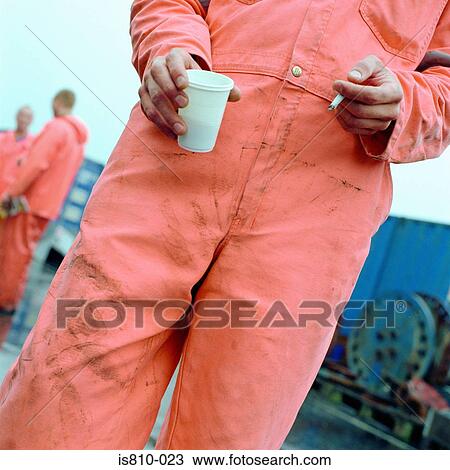 Construction worker with coffee and cigarette View Large Photo Image Stock Image - Construction worker with coffee and cigarette. Fotosearch