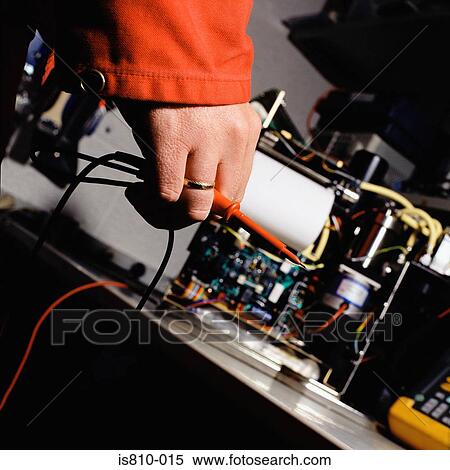 Engineer working on machinery View Large Photo Image Stock Photography - Engineer working on machinery. Fotosearch
