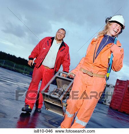 Stock Photograph - Two construction workers. Fotosearch