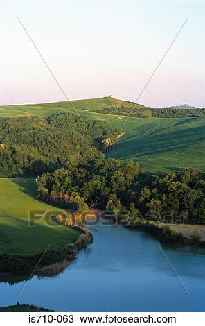 Grassy hills near lake View Large Photo Image Stock Image - Grassy hills near lake. Fotosearch