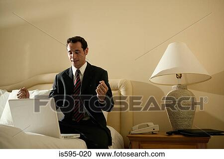 Stock Image - Businessman celebrating. Fotosearch