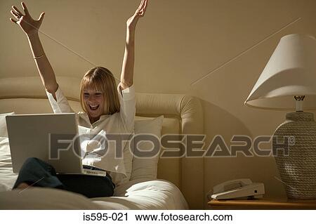Businesswoman using laptop computer View Large Photo Image Stock Image - Businesswoman using laptop computer. Fotosearch