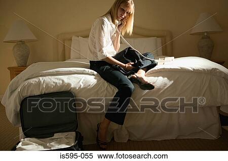 Stock Photography - Businesswoman using telephone. Fotosearch