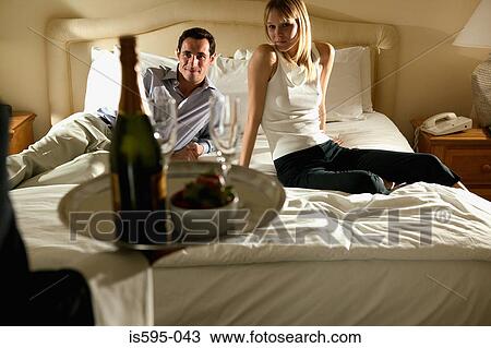 Couple receiving room service View Large Photo Image Stock Image - Couple receiving room service. Fotosearch