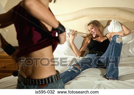 Young couple in hotel room View Large Photo Image Stock Image - Young couple in hotel room. Fotosearch